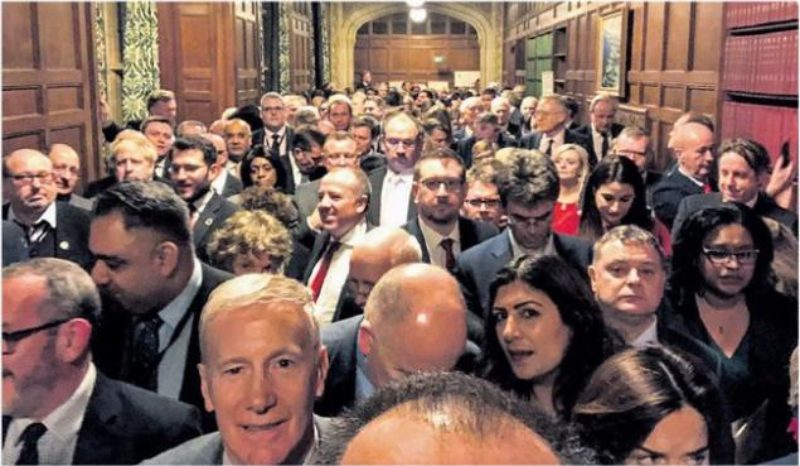 MPs are counted through a packed No lobby to vote against the Withdrawal Agreement. Janet can be seen on the right in the foreground of the photograph.