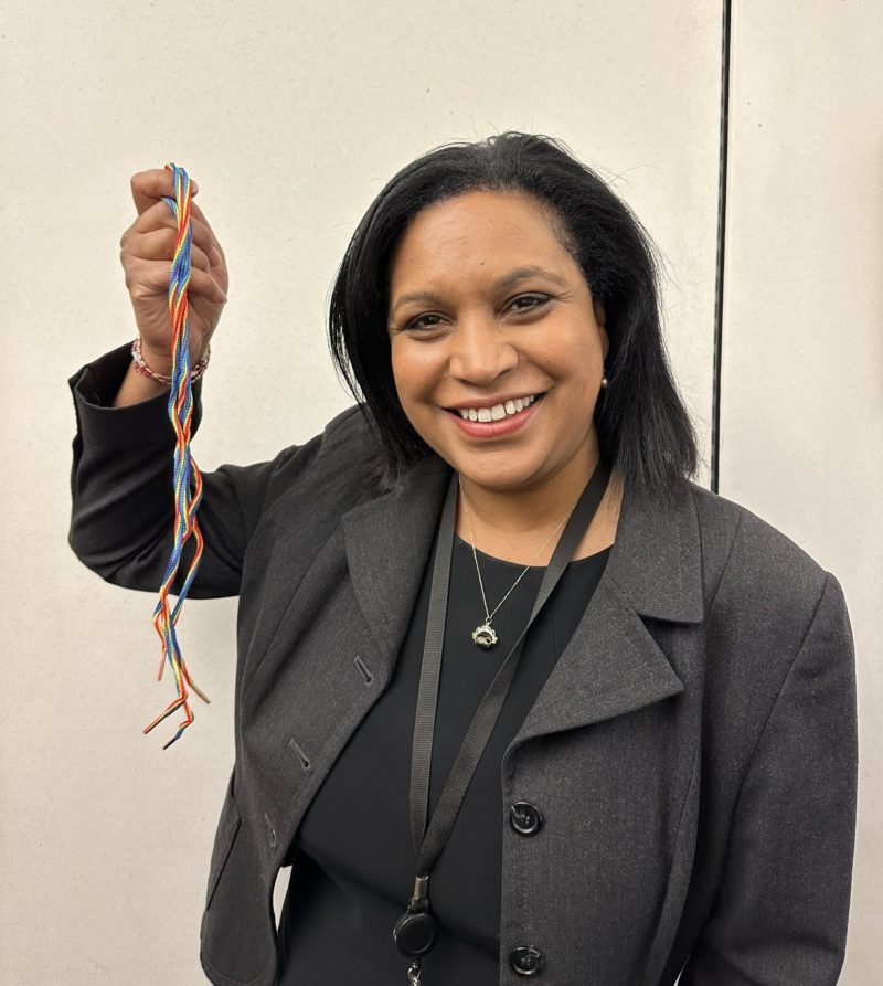 Janet Daby MP picking up her rainbow laces from Stonewall