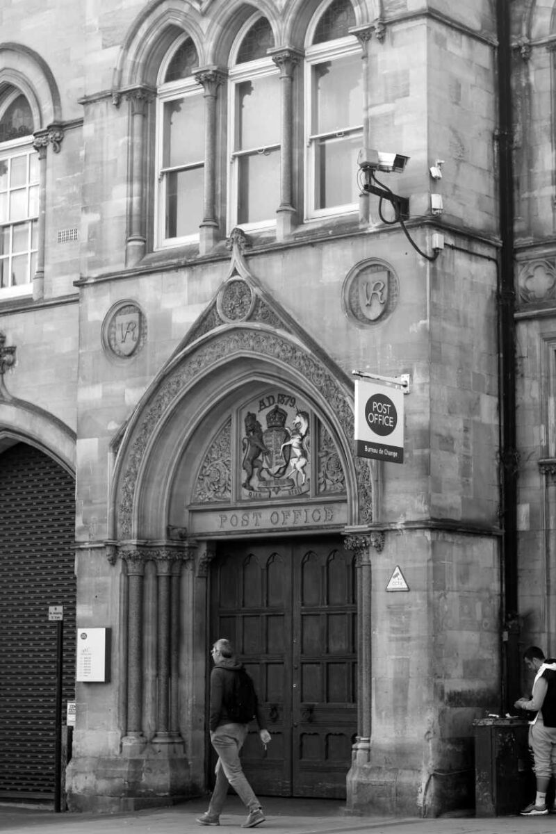 Black and white image of a Post Office building